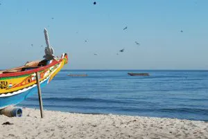 Painted Pirogue on a Beach in Dakar