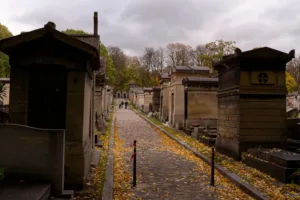Autumn Path through a Historic Paris Cemetery