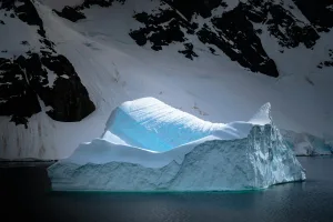 Blue Iceberg below the Mountains, Antarctica