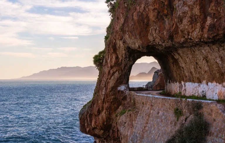 Coastal Road through a Rock Arch, Jijel