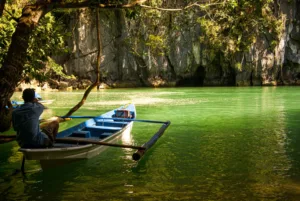 Paddle Boat by the Cliffs, Puerto Princesa Underground River